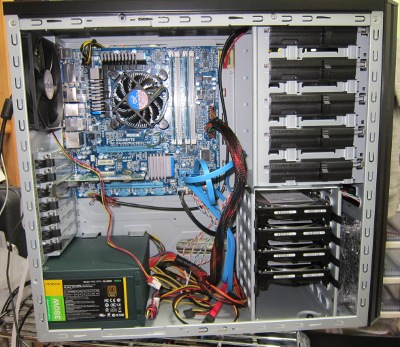 Motherboard, PSU and 4 RAID drives in case